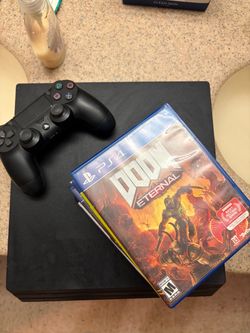 PS4 Slim Console with Controller and Doom Eternal