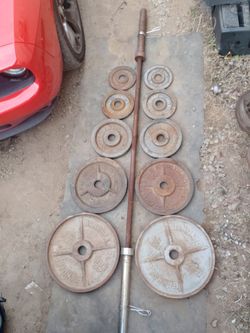 240lbs Olympic weights+ 7ft Olympic bar