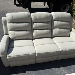 Reclining sofa, coffee table, and table dining room table with four chairs and a nightstand