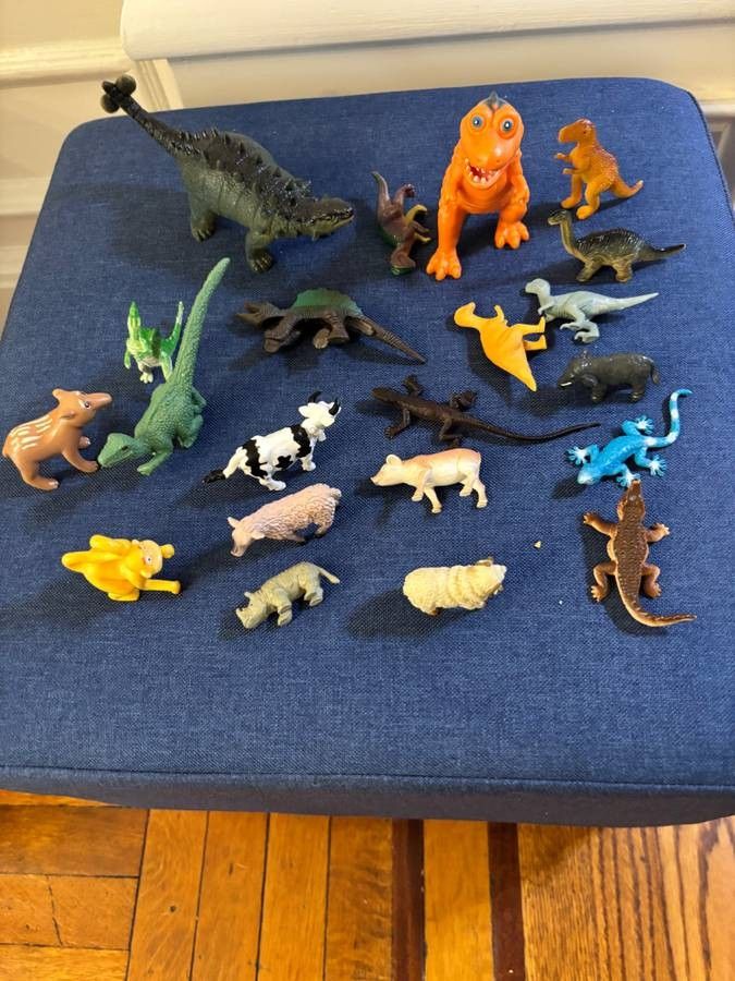 Lot of Plastic Dinosaurs and other Animals.