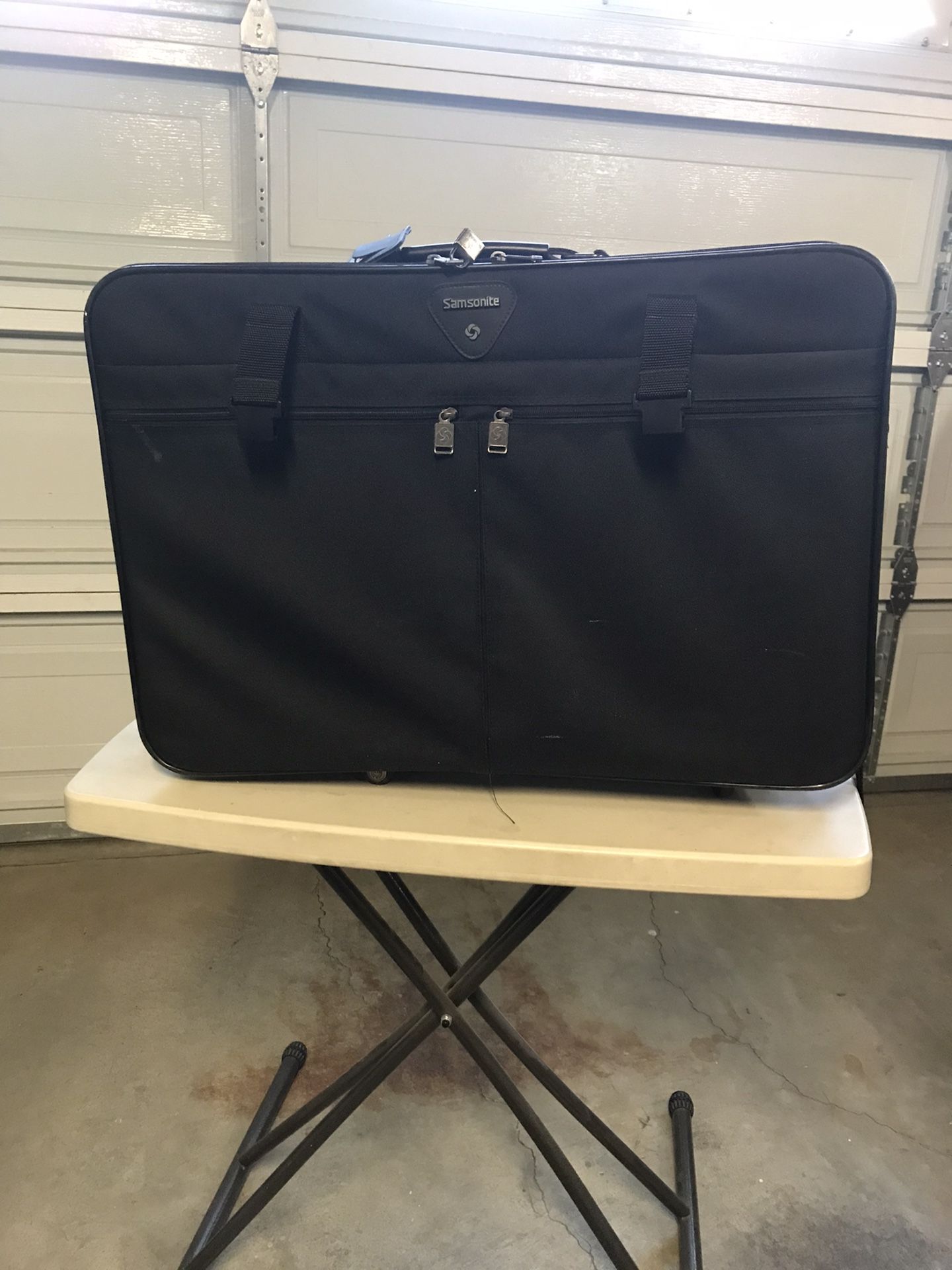 26” black soft side suitcase