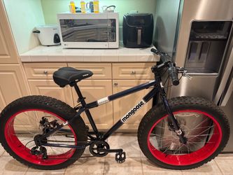 Like new- Mongoose Dolomite fat tire 4” all terrain bike