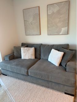 Living spaces gray couch