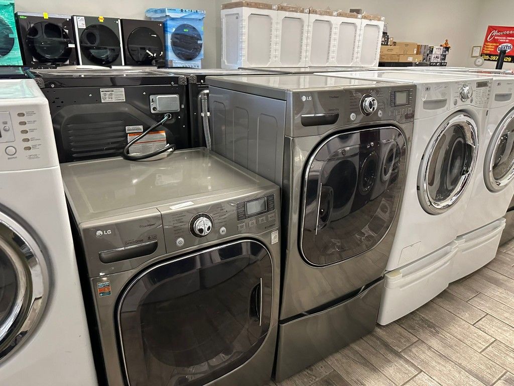 LG washer and dryer set electric mega capacity with one included pedestal