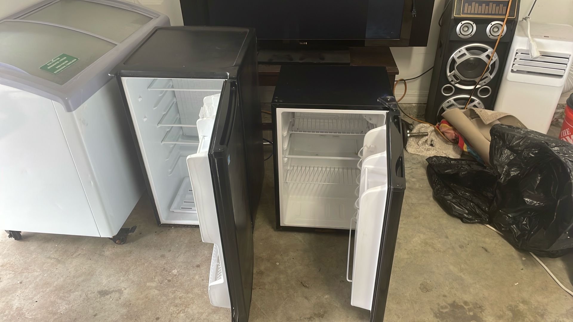 Two small refrigerators