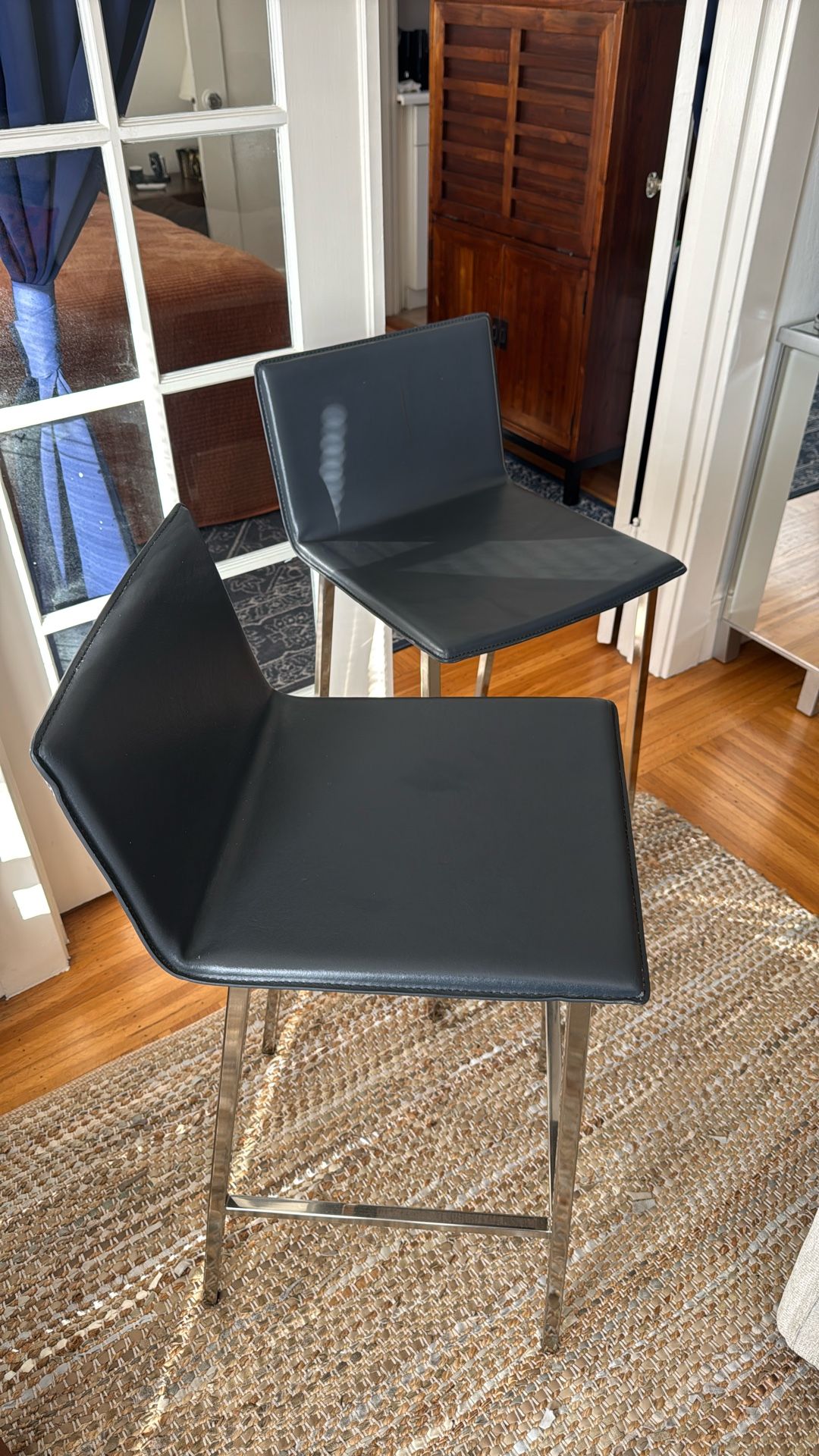 2 CB2 Bar Height Stools