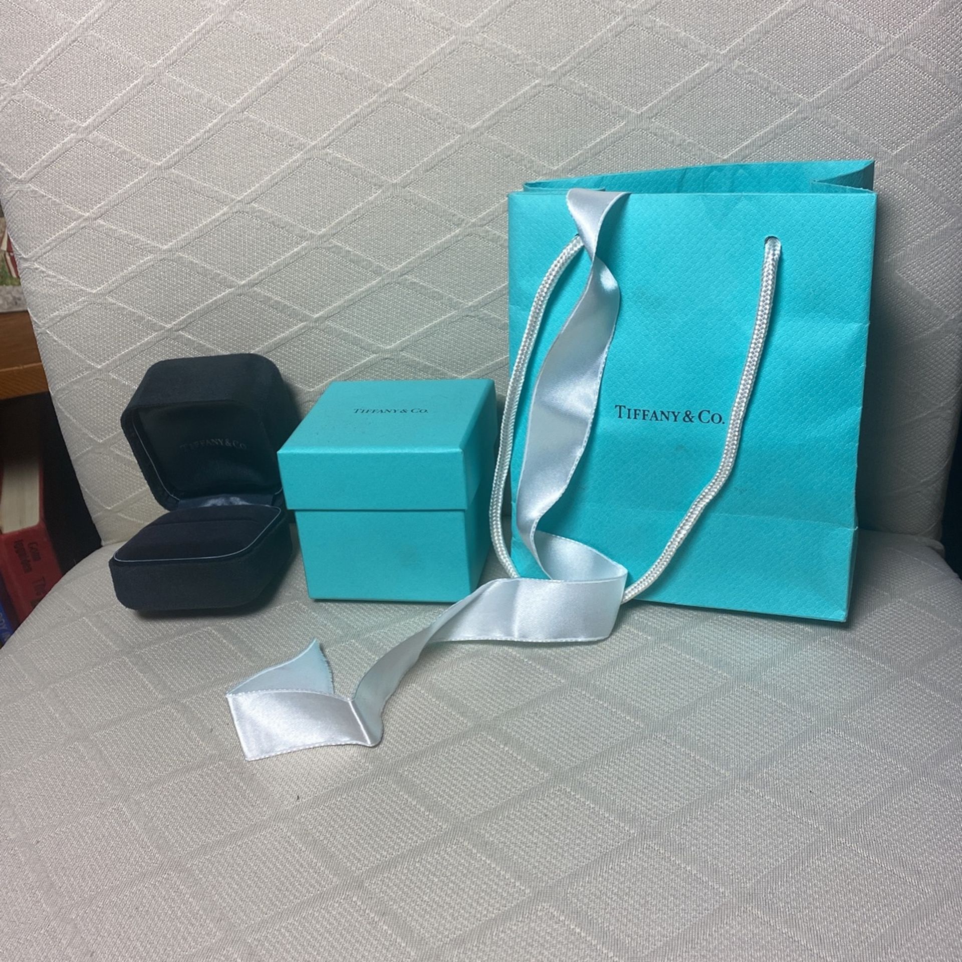 Tiffany bag, black ring box, outer blue box and white ribbon