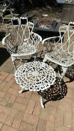 White Cast Aluminum 3 Pieces Patio Chairs and little table.