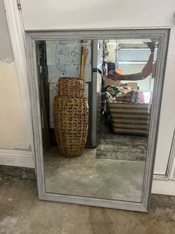 Large framed  beveled mirror .. can be hung either way