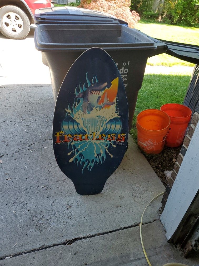 wooden shark surf board
