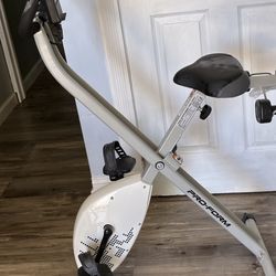 Pro form bike with mat 2 lb weights