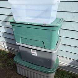 4 large tubs / bins one missing a lid