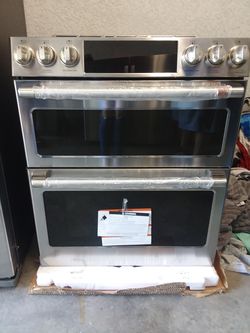 New Smart Alexa Cafe Stainless Steel double oven convectional Range with 90 day warranty and delivery included!!!!