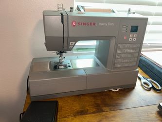 Sewing Machine/All Business Supplies  $175