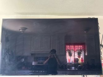 55-60 inch Samsung kitchen TV with stand.