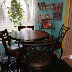 Pier 1 Furniture.  Bar Height Table and 4 Stools