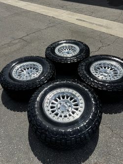 KMC KM552 IMS 6x135 Wheels with 35” Nitto Ridge Grappler Tires Machined