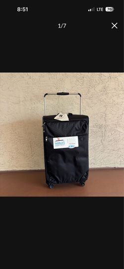 One New Lightweight IT Luggage Checked with Tags