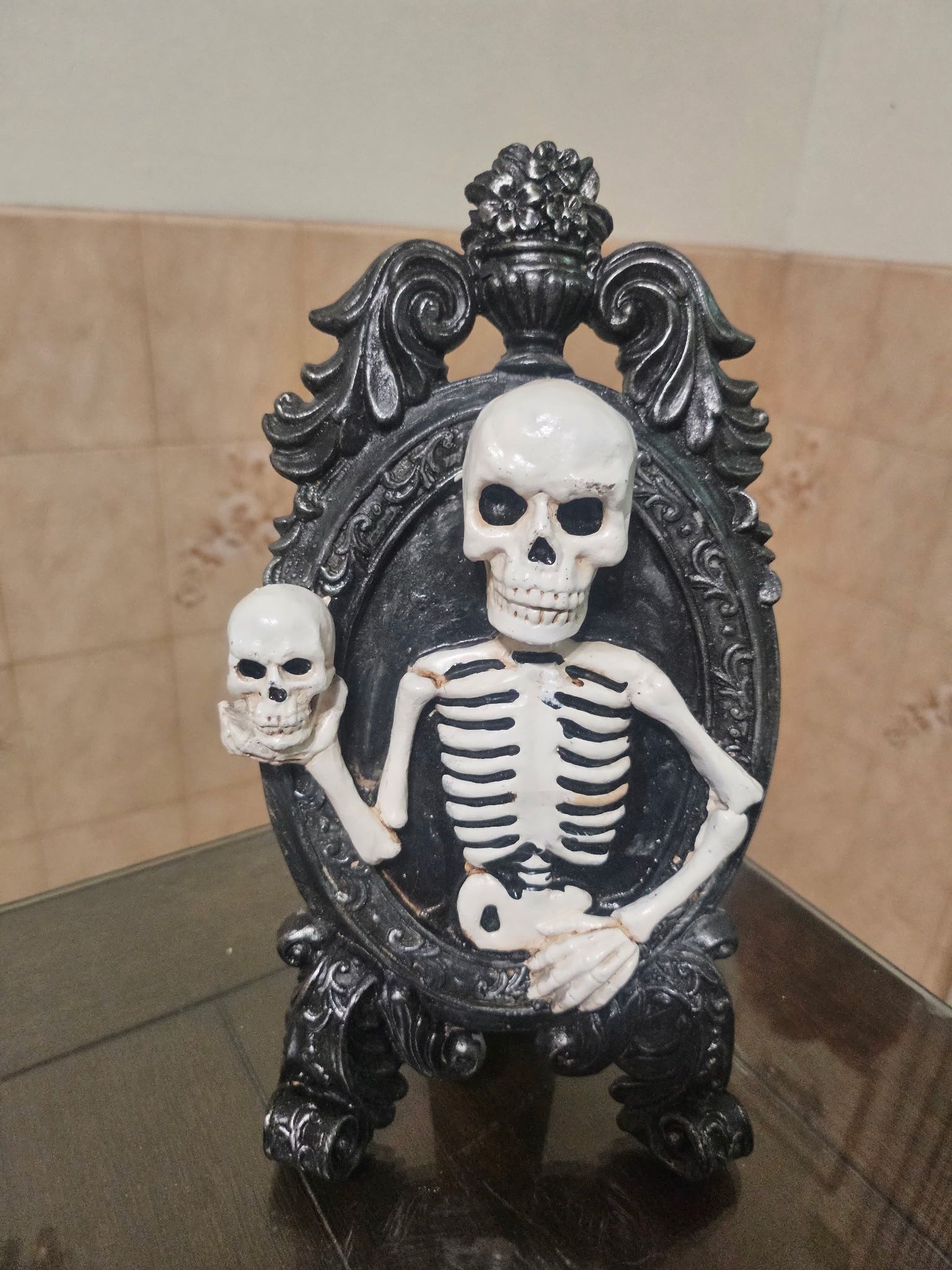 National Tree Company Skeleton Holding A Skull Portrait Decoration, Halloween Collection, 10 Inches