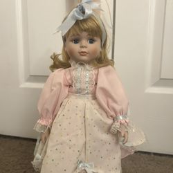 "Heidi" porcelain doll from the Regal Doll Collection.  