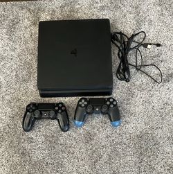 Sony PlayStation 4 Slim 1TB Console  With 2 Controllers