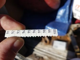 Terminal block markers. Each box has several sets numbered from 1-100