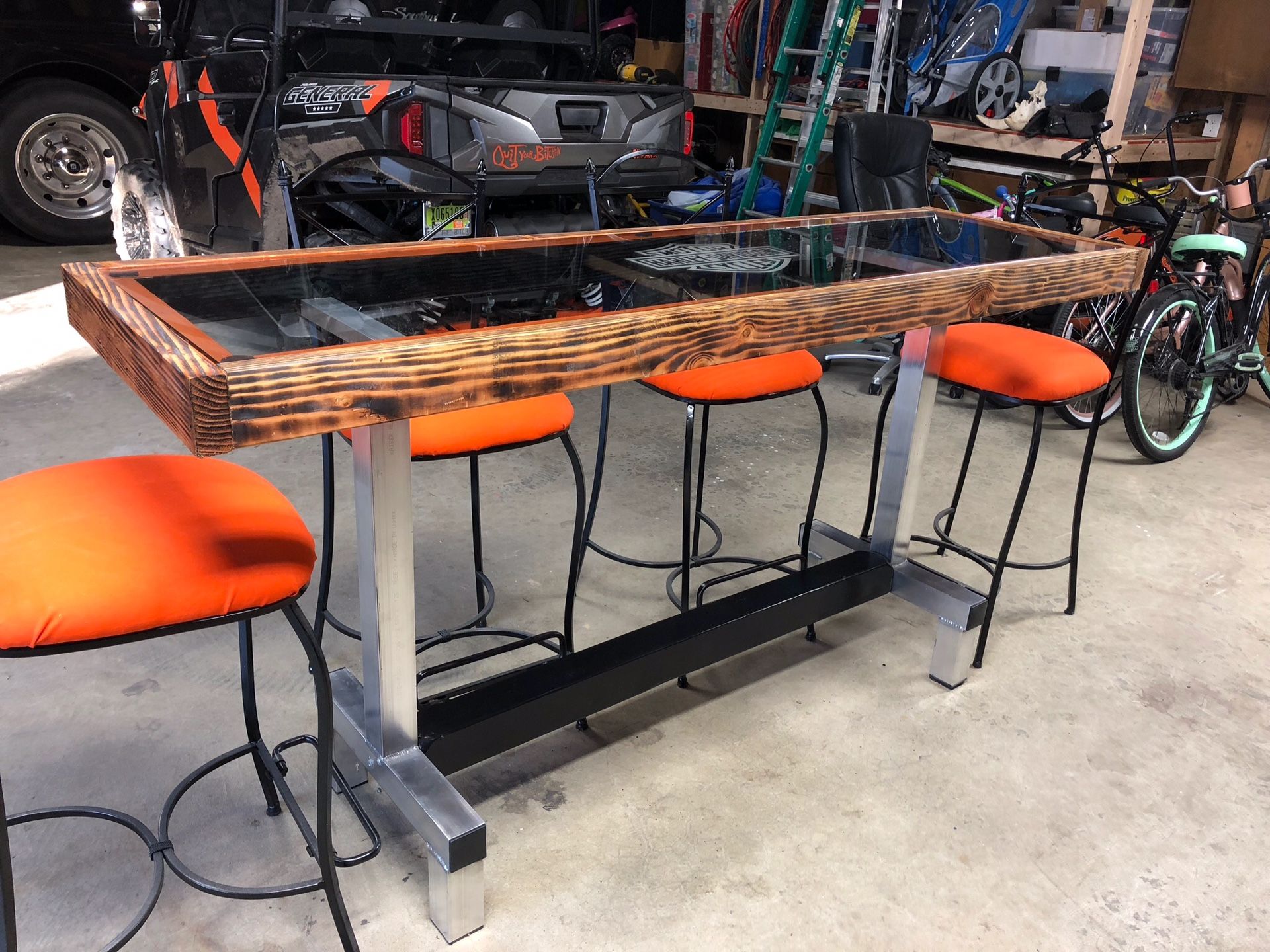 Harley Davidson themed bar table and bar stools for Sale in Lake