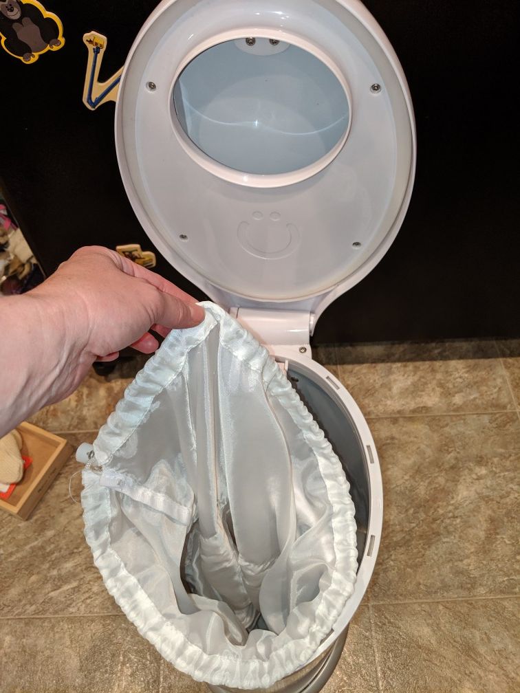 Ubbi cloth diapering pail with with two waterproof liners