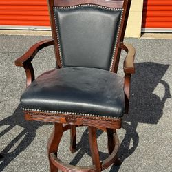 2 Faux Leather Counter Height Swivel Chairs