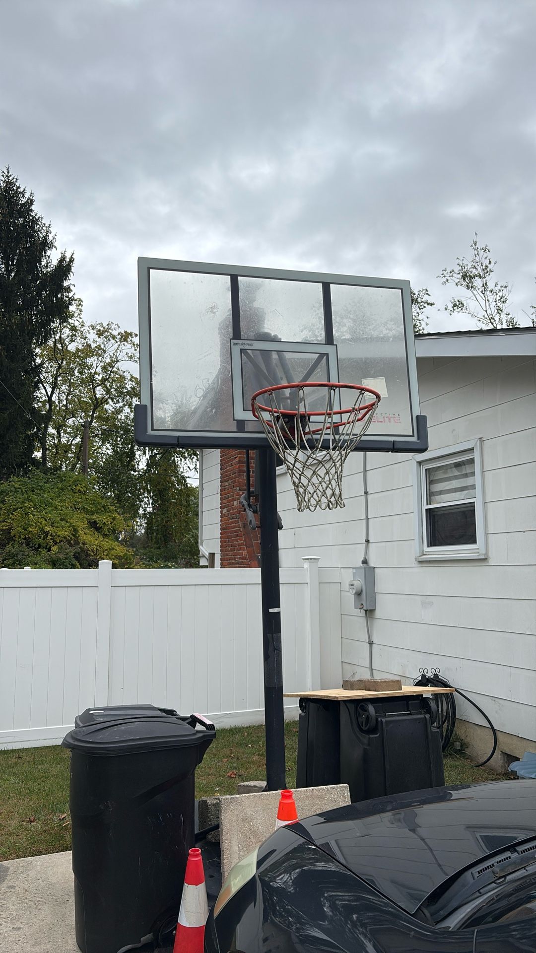 Adjustable Lifetime Elite Basketball hoop.  