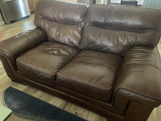 3 piece leather couch and 2 love seats.