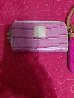 Dooney & Bourke pink crocodile embossed leather zip-around wallet