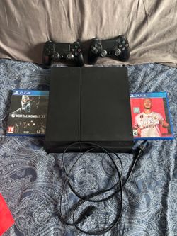 Ps4 1tb with 2 games and 2 controllers