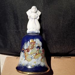 Vintage 1992 Avon "Heavenly Notes" Christmas bell. 
