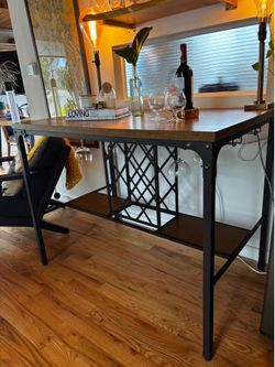 Industrial bar table with wine glass storage