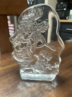 Glass decorative figurine of Angel leading children across the bridge