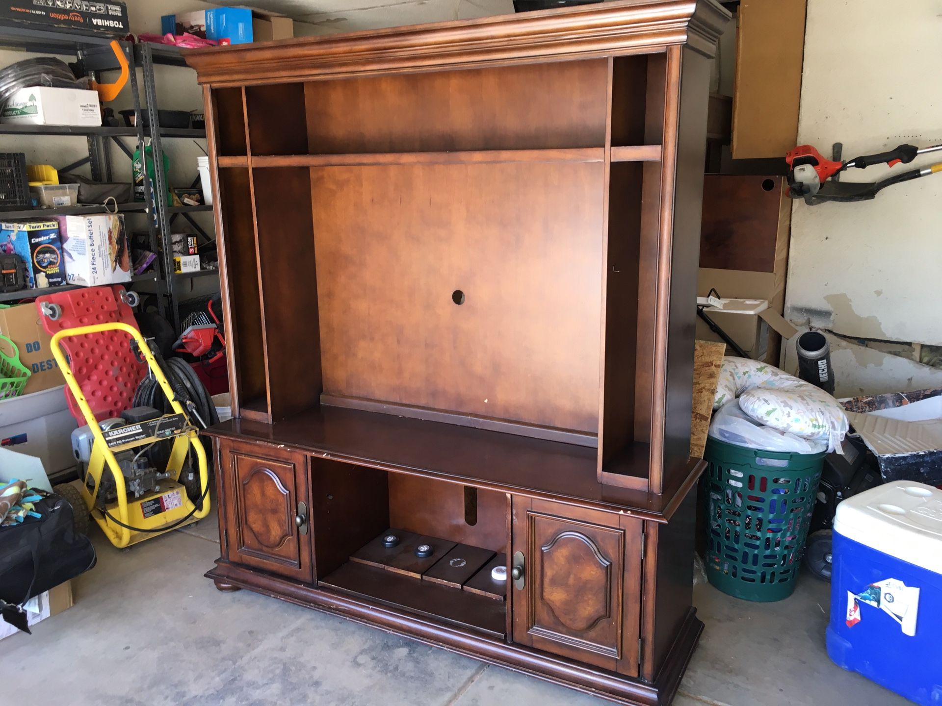 Television stand with cabinets and shelves