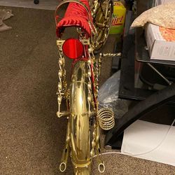 Golden lowrider bike