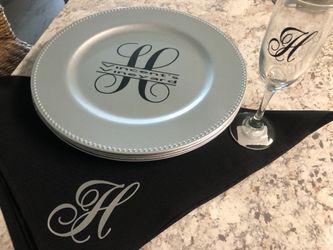 Custom charger plates, napkins, champagne glasses
