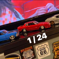 Over 150 cars , trucks, motorcycles