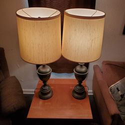 Matching pair of tall brass table lamps