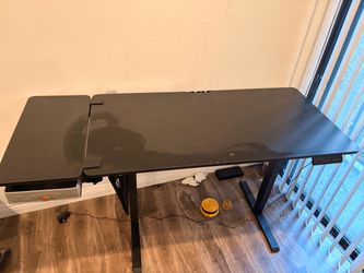 standing desk. Couch. Vanity desk