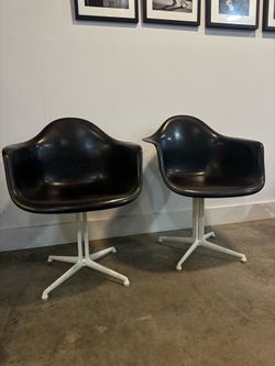 Pair of authentic Herman Miller Eames “La Fonda fiberglass shell armchairs