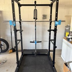 Power cage with weights and bench