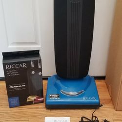 NEW cond CORDLESS  RICCAR COMMERCIAL VACUUM WITH COMPLETE ATTACHMENTS  , CHARGING  ,  ONLY USED ONCE FOR  DEMO  ,  RETAL PRICE  $799