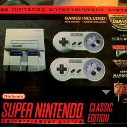 Super Nintendo Entertainment System, Classic Edition.  Brand New In Box With Over 20 Games
