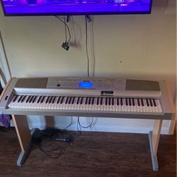Yamaha Piano Keyboard With Stand 