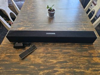 Black Soundbar with Remote and Power Adapter