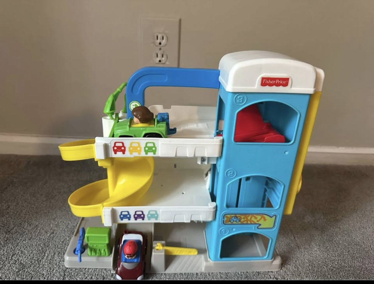 . Fisher-Price Little People - Helpful Neighbor Garage Playset with Spiral Ramp and 2 Cars