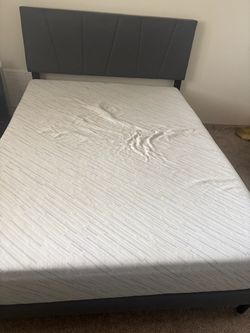 Gray Upholstered Bed Frame with Mattress